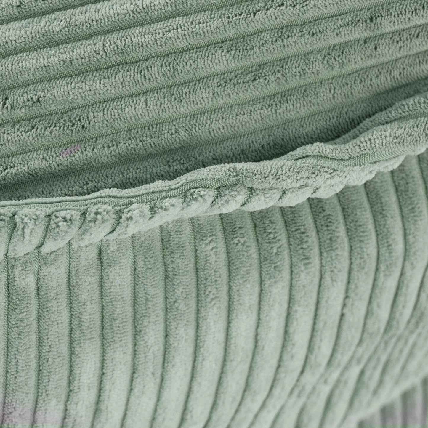 Matière velours côtelé de pouf vert